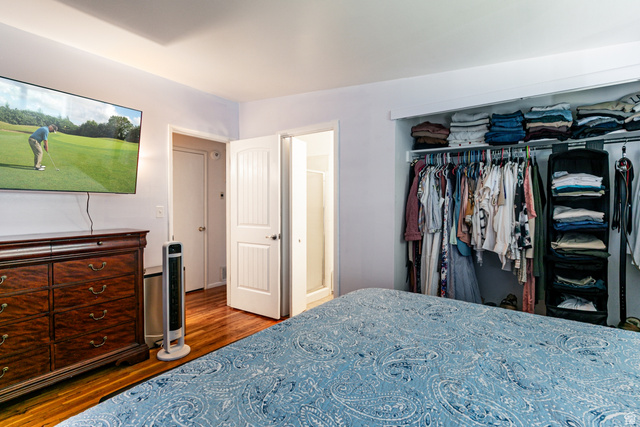 1619 Davis Drive Layton, UT 84041 - Photo 11 of 27 Bedroom featuring wood flooring, a large closet with king size bed
