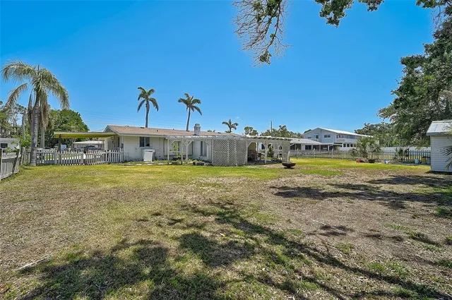 a view of a house with a big yard