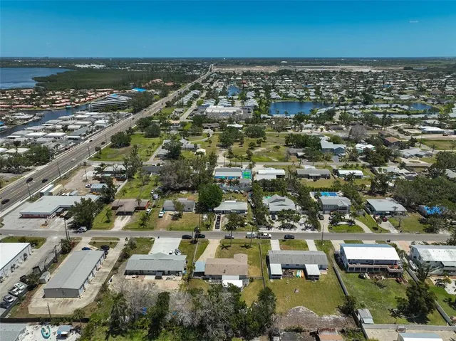 an aerial view of residential building with parking space