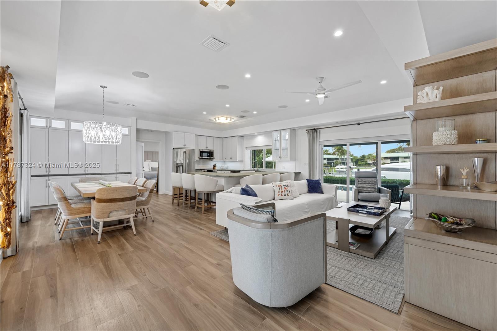 64 Tarpon Lane Key Largo, FL 33037 - Photo 3 of 22 a living room with furniture and a large window