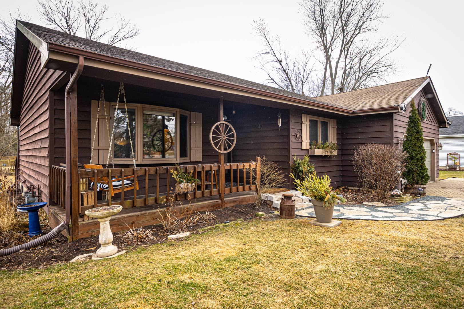 1403 West Beach Road Waukegan, IL 60087 - Photo 1 of 59 a front view of a house with parking area