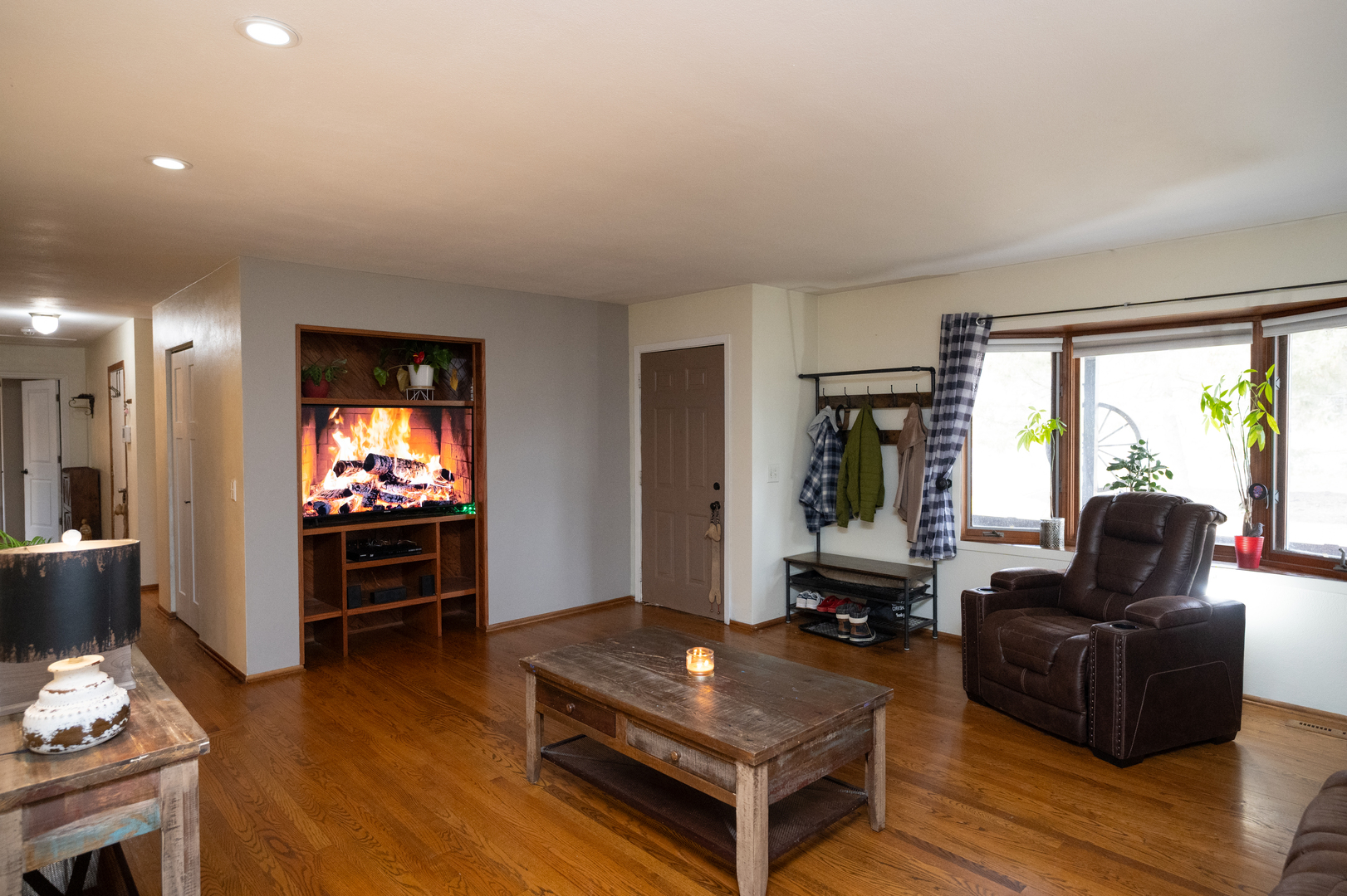 1403 West Beach Road Waukegan, IL 60087 - Photo 17 of 59 a living room with furniture and a flat screen tv