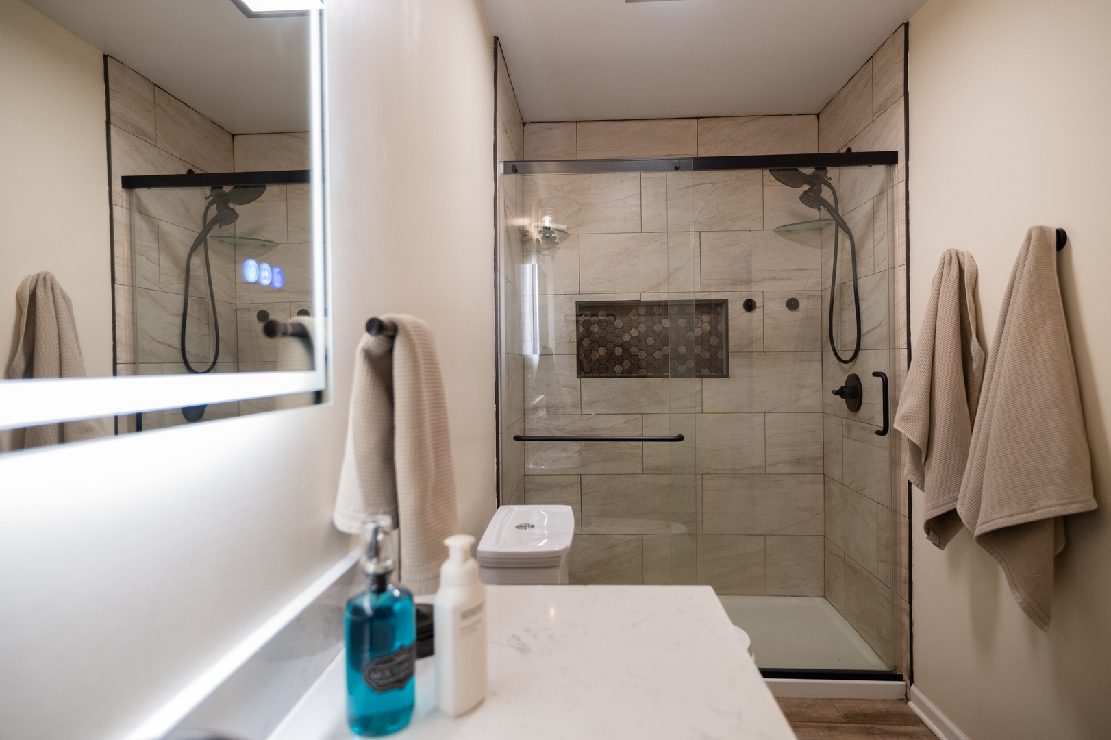 1403 West Beach Road Waukegan, IL 60087 - Photo 31 of 59 a bathroom with a shower and a sink