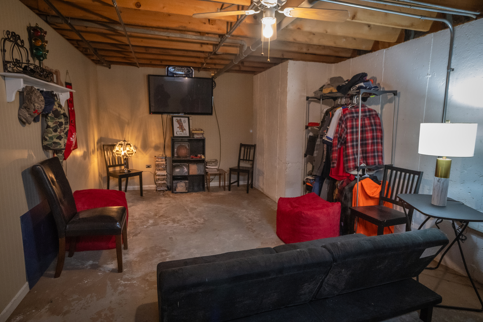 1403 West Beach Road Waukegan, IL 60087 - Photo 37 of 59 a living room with furniture and a flat screen tv