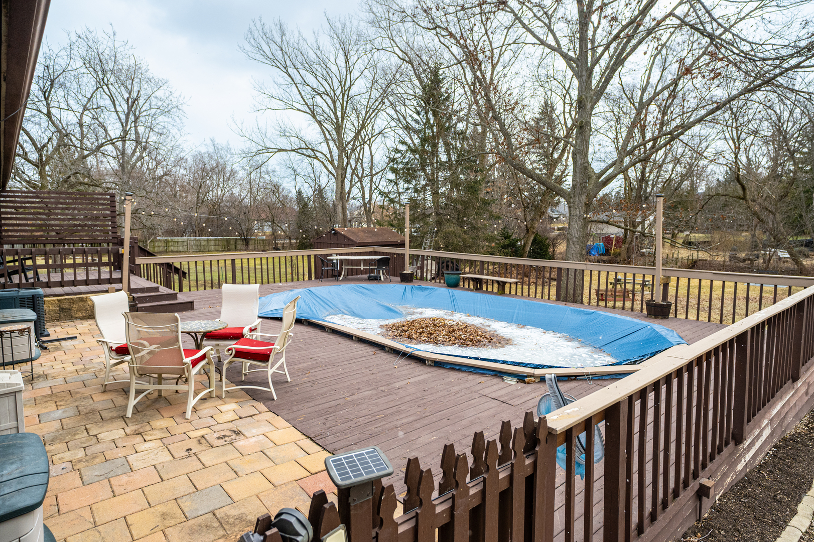 1403 West Beach Road Waukegan, IL 60087 - Photo 48 of 59 a view of a swimming pool with a patio and a backyard