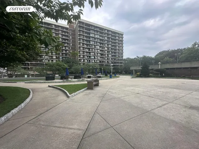 a view of swimming pool outdoor seating and lake view