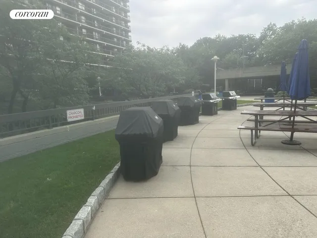 a view of a terrace with couches and sky view