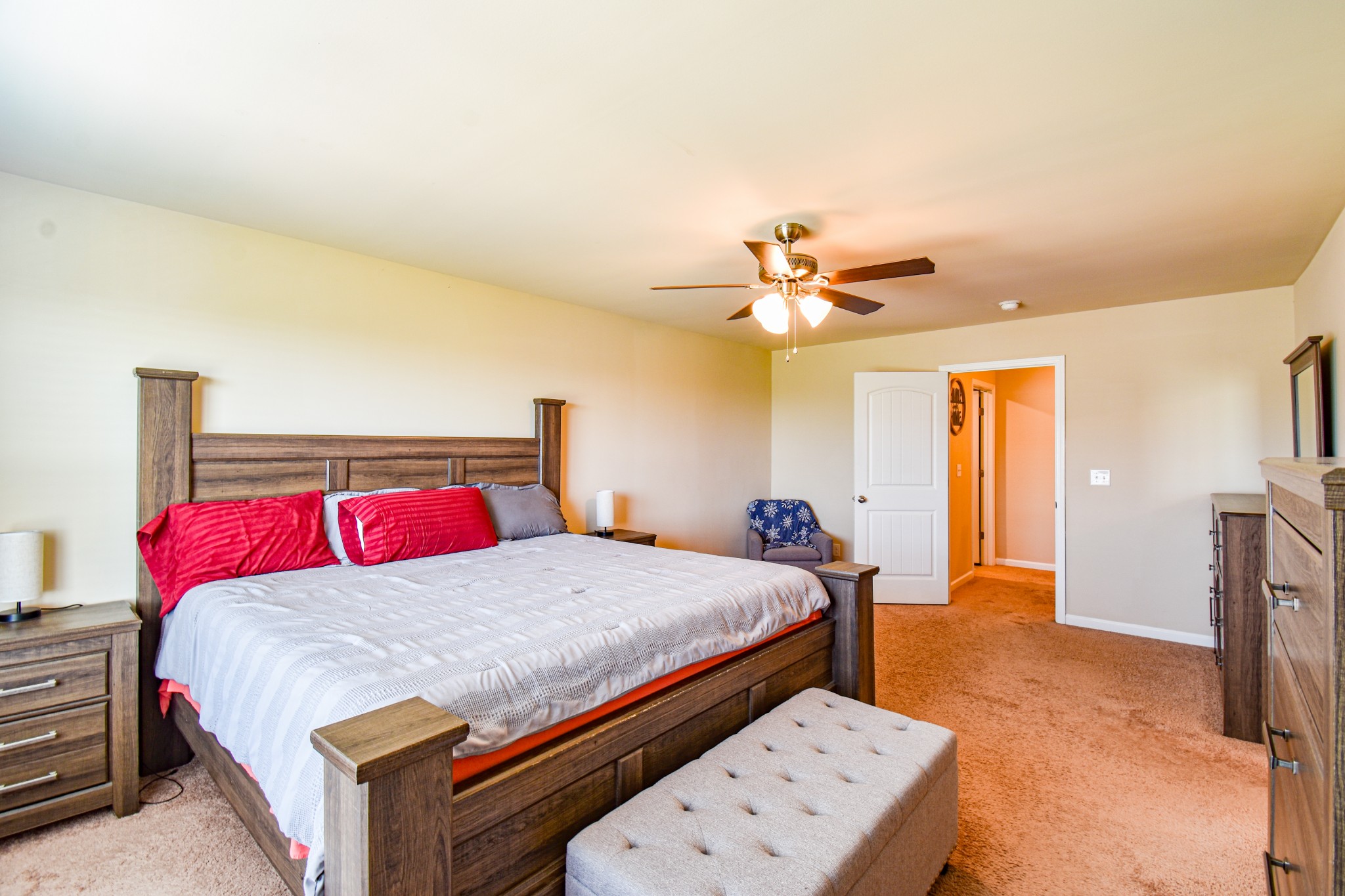 742 Prominence Road Columbia, TN 38401 - Photo 21 of 33 a bedroom with a bed and a chandelier