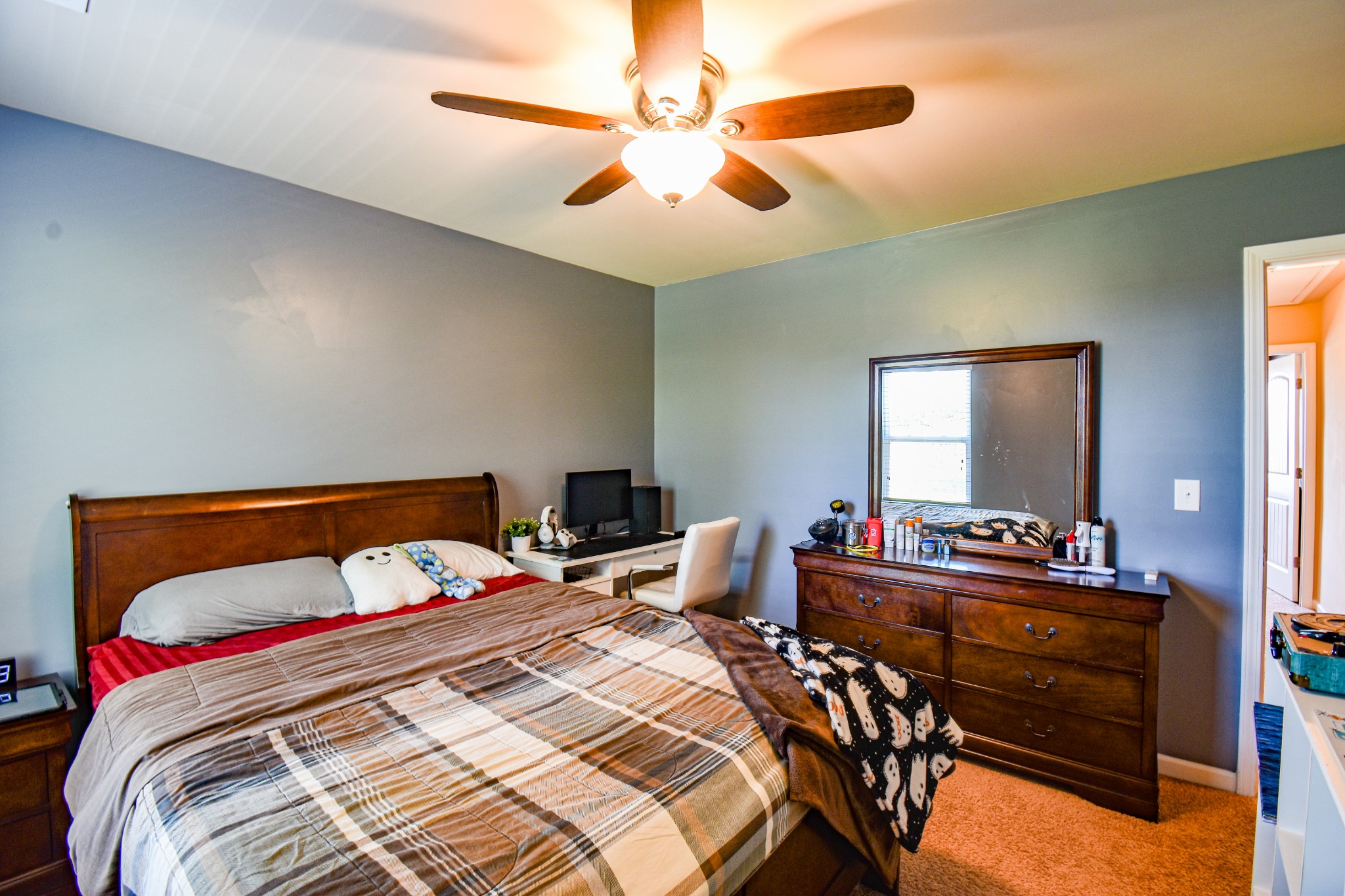 742 Prominence Road Columbia, TN 38401 - Photo 27 of 33 a bedroom with a bed and a chandelier