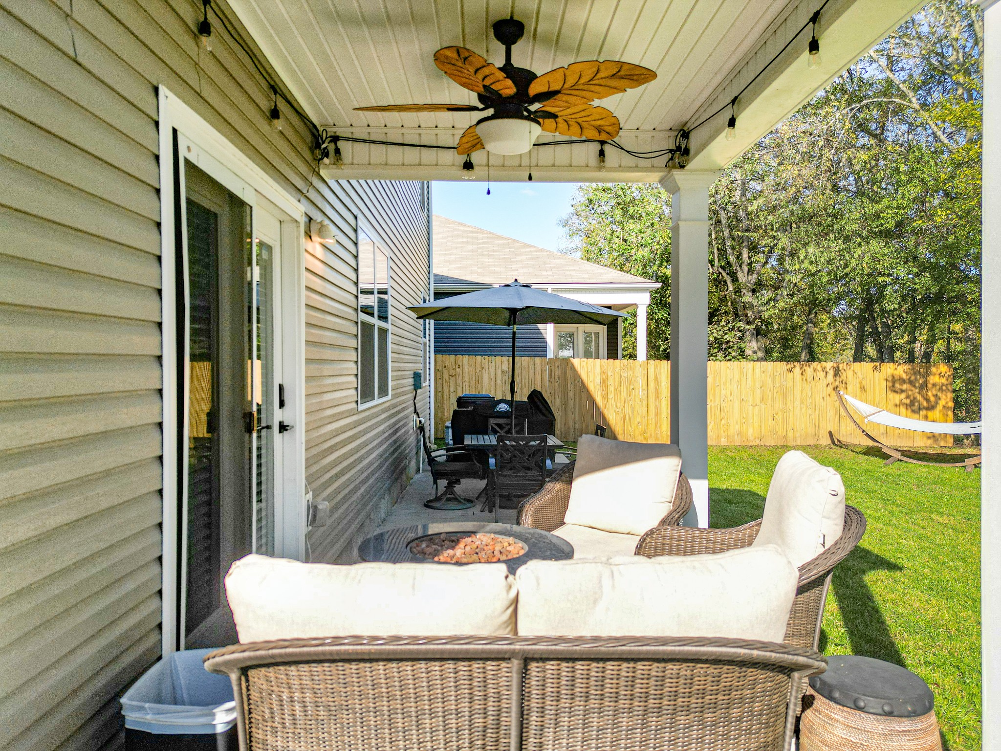 742 Prominence Road Columbia, TN 38401 - Photo 4 of 33 a view of a patio with a table chairs and a potted plant