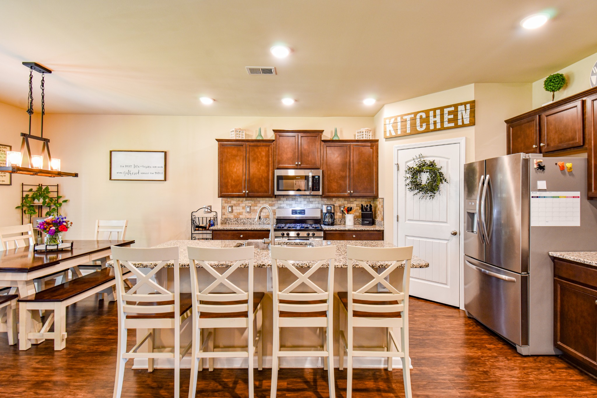 742 Prominence Road Columbia, TN 38401 - Photo 9 of 33 a kitchen with granite countertop a refrigerator and microwave