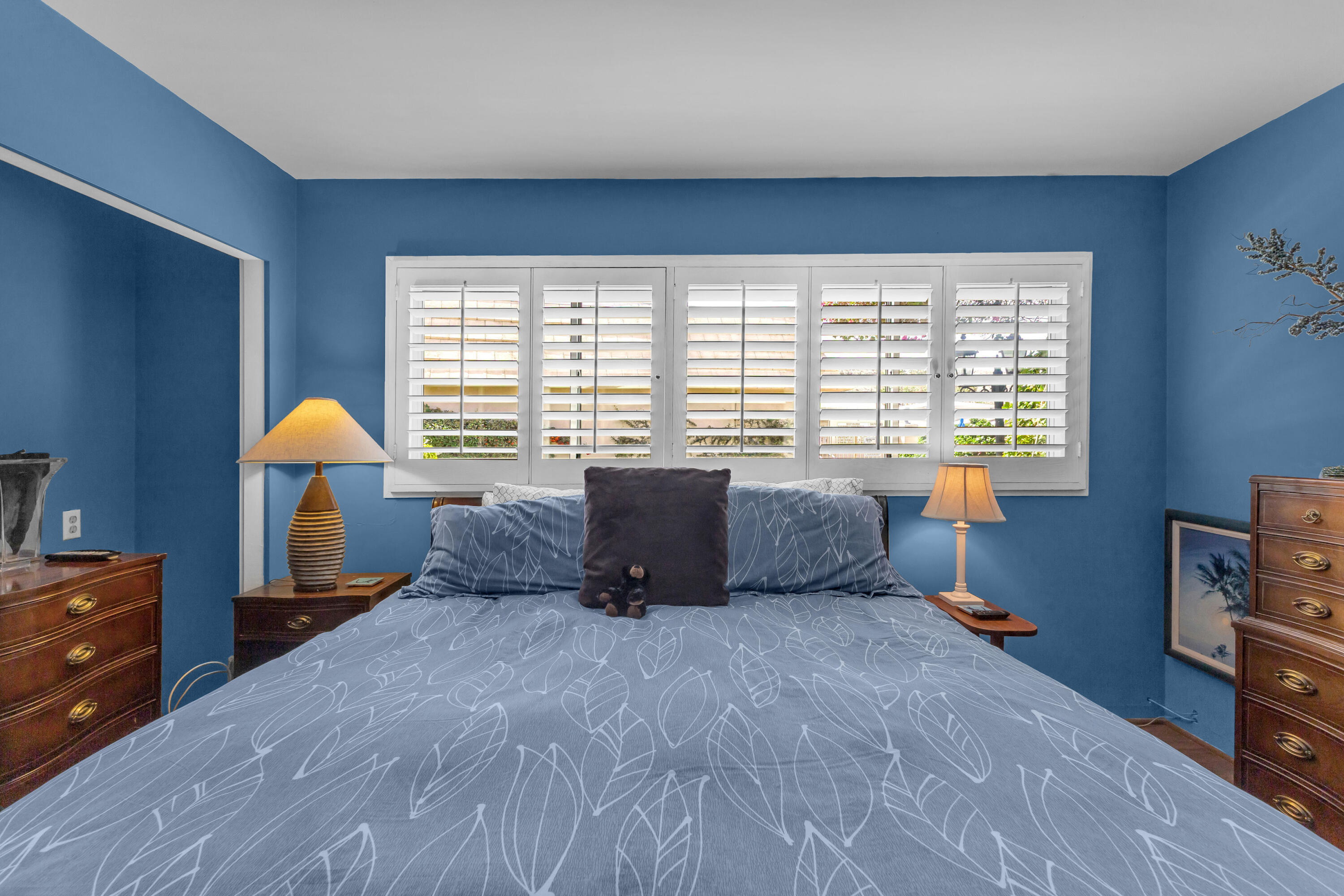 69850 Hwy 111 Rancho Mirage Ca, Unit 14 Rancho Mirage, CA 92270 - Photo 23 of 56 a bedroom with furniture and a window