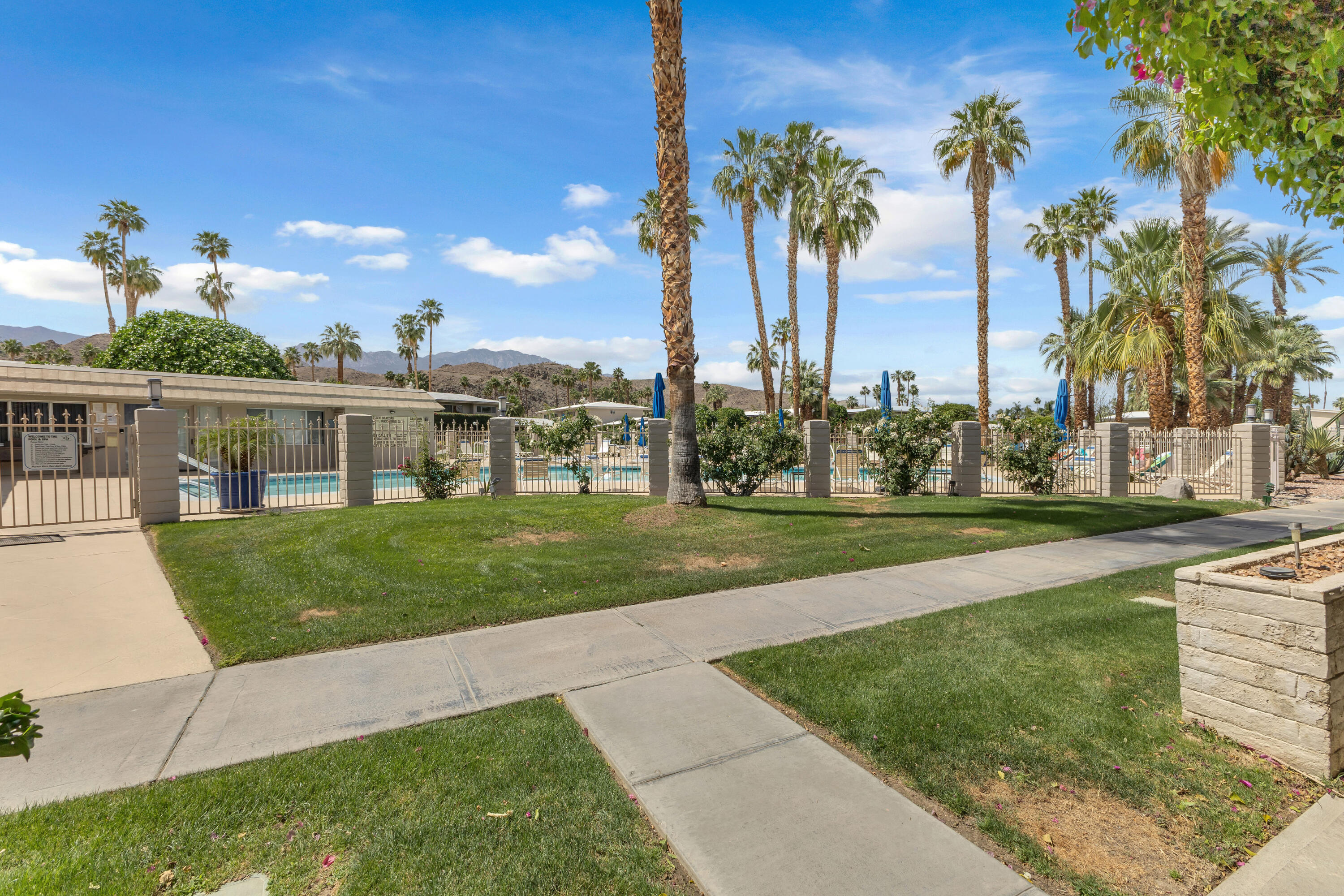 69850 Hwy 111 Rancho Mirage Ca, Unit 14 Rancho Mirage, CA 92270 - Photo 35 of 56 a view of a house with a big yard