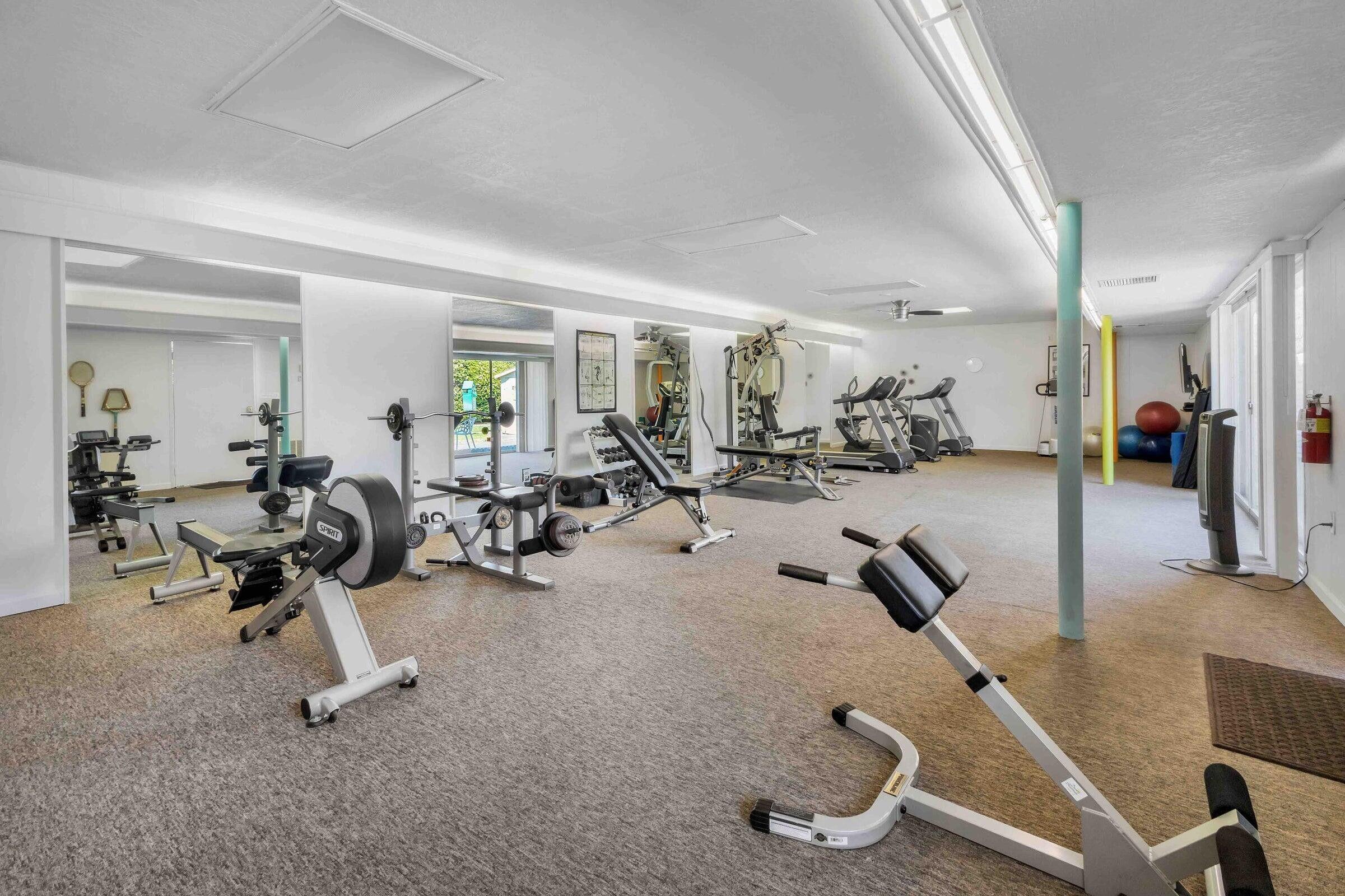 69850 Hwy 111 Rancho Mirage Ca, Unit 14 Rancho Mirage, CA 92270 - Photo 48 of 56 a view of a room with gym equipment