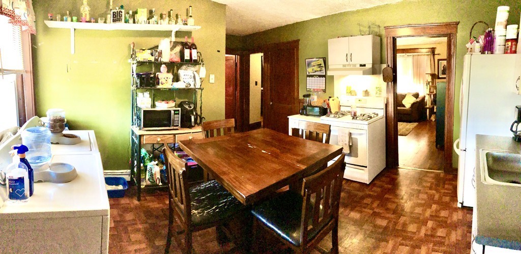 88 Congress Street, Unit 3 Salem, MA 01970 - Photo 3 of 15 a view of a dining room with furniture and a table