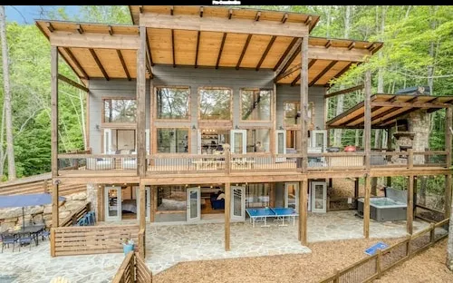 a view of a chairs and table in the patio