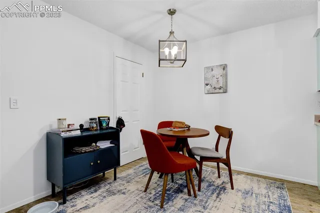a view of a dining room with furniture