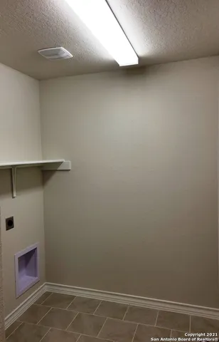 a view of small space with racks on the wall