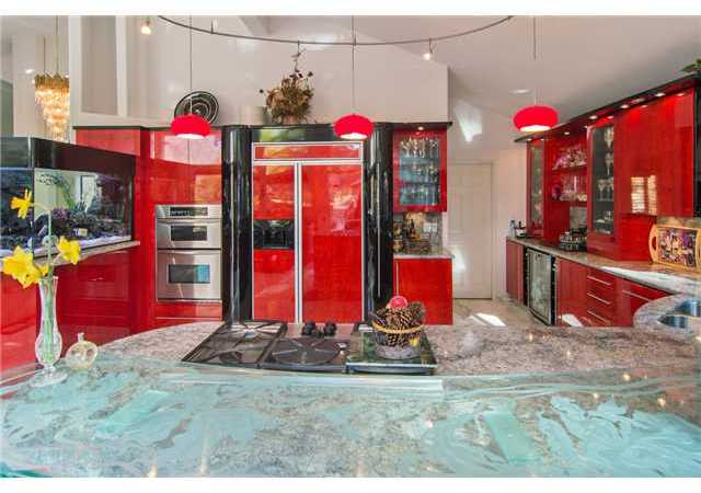 3060 Racetrack View Drive Del Mar, CA 92014 - Photo 8 of 20 Russian blue granite slab counter tops. Custom Birds eye maple cabinets
