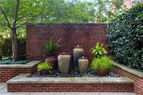 a large kitchen with a table and chairs in it