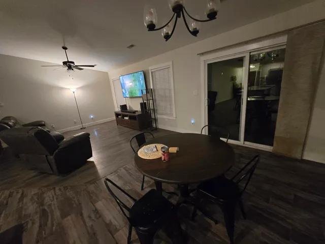 a living room with furniture and a table