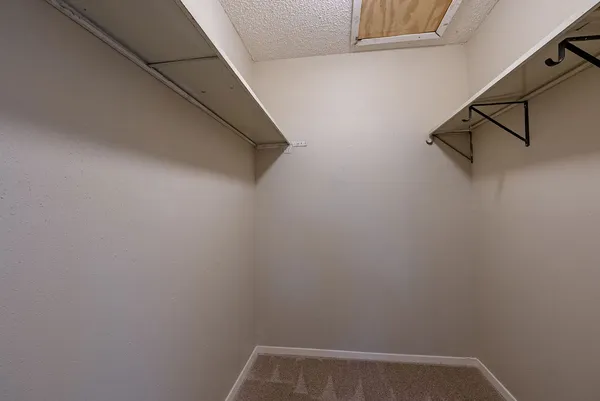 a view of small space with racks on the wall