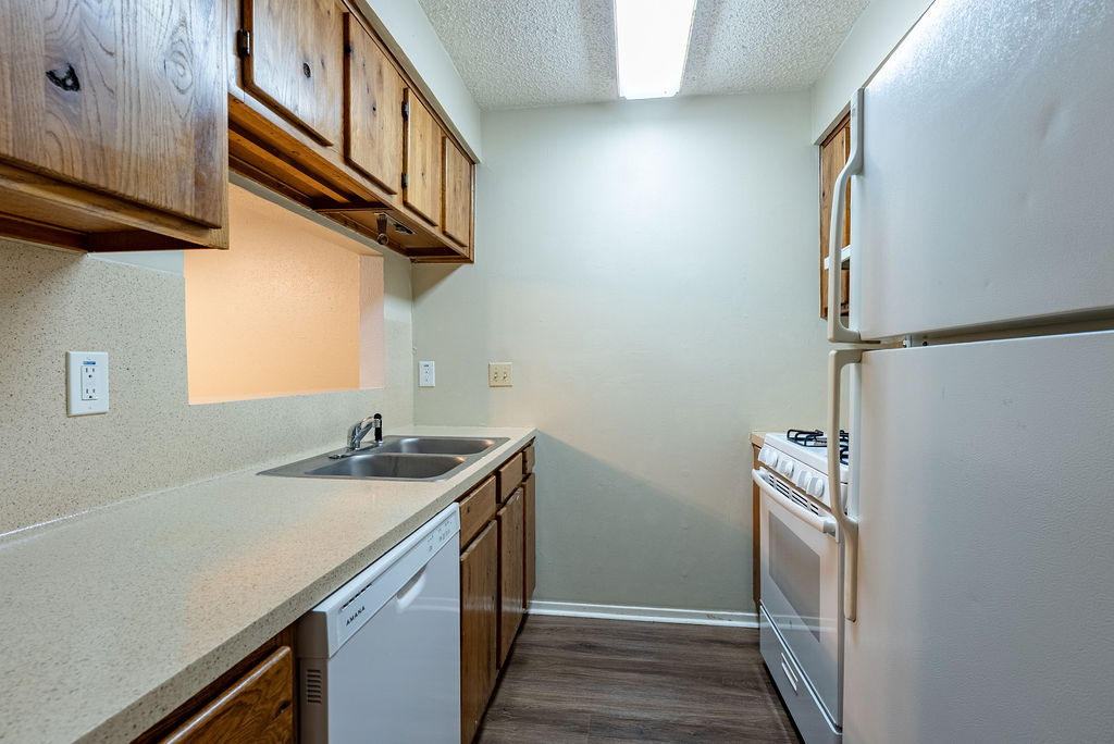 1205 Inland Greens, Unit B Austin, TX 78758 - Photo 6 of 17 a utility room with a sink a washer and dryer