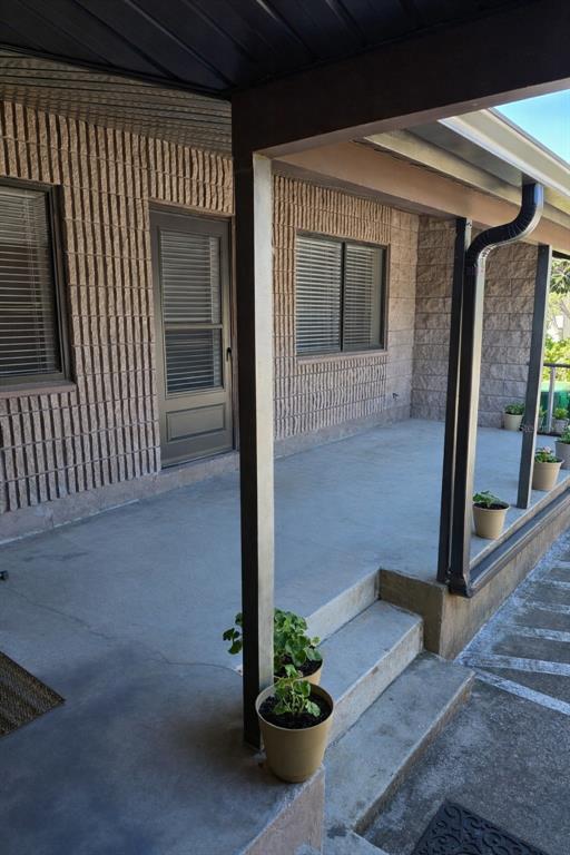 9000 Griggs Road, Unit G Englewood, FL 34224 - Photo 2 of 24 a front view of a house