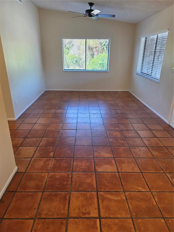 9000 Griggs Road, Unit G Englewood, FL 34224 - Photo 4 of 24 an empty room with a window