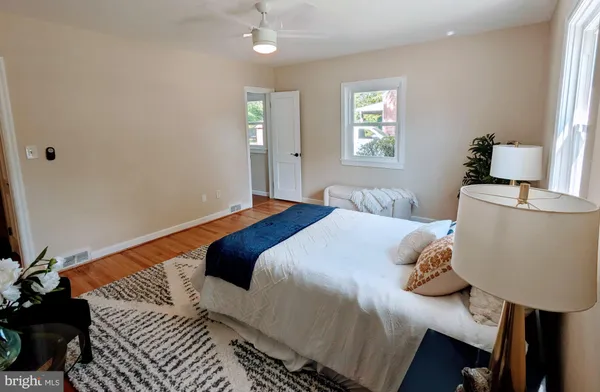 a bathroom with a double vanity sink and mirror