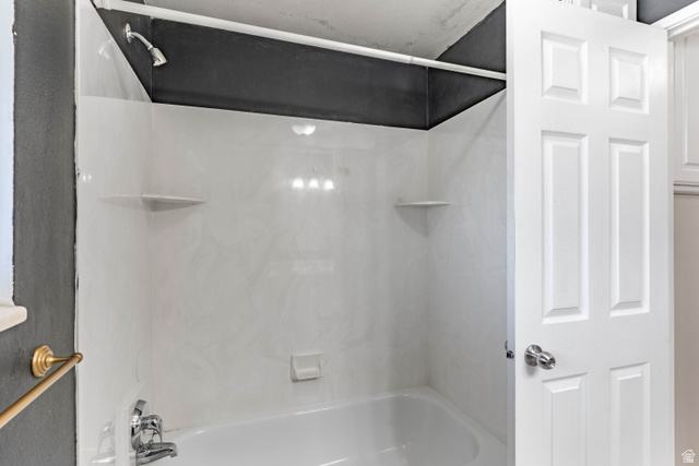 728 400 East Orem, UT 84097 - Photo 19 of 30 White tub and shower combination with integrated shelving