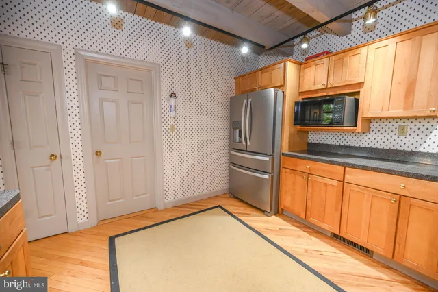 a view of a balcony with furniture