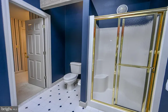 a bathroom with a sink toilet and vanity