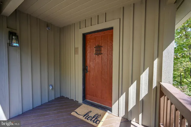 a room with a door and wooden floor