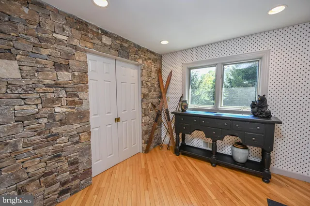 a kitchen with stainless steel appliances granite countertop a sink and cabinets