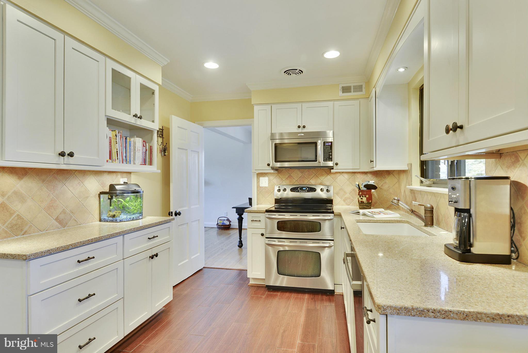10307 Ridgemoor Drive Silver Spring, MD 20901 - Photo 4 of 30 Attractively renovated eat-in kit has tiled floors