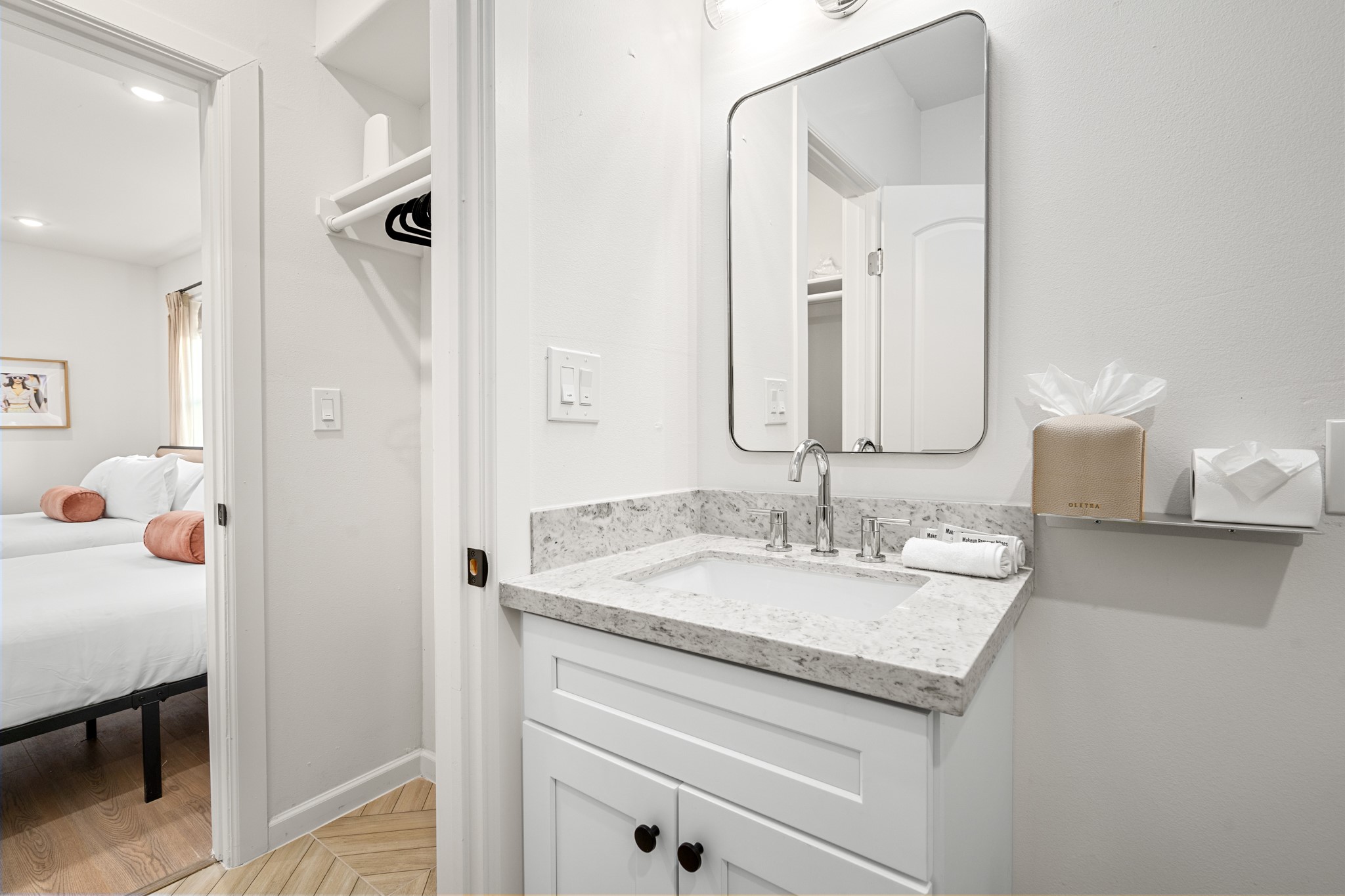 2413 Isabella Street Houston, TX 77004 - Photo 18 of 50 a en suite bathroom with a granite countertop sink and a mirror