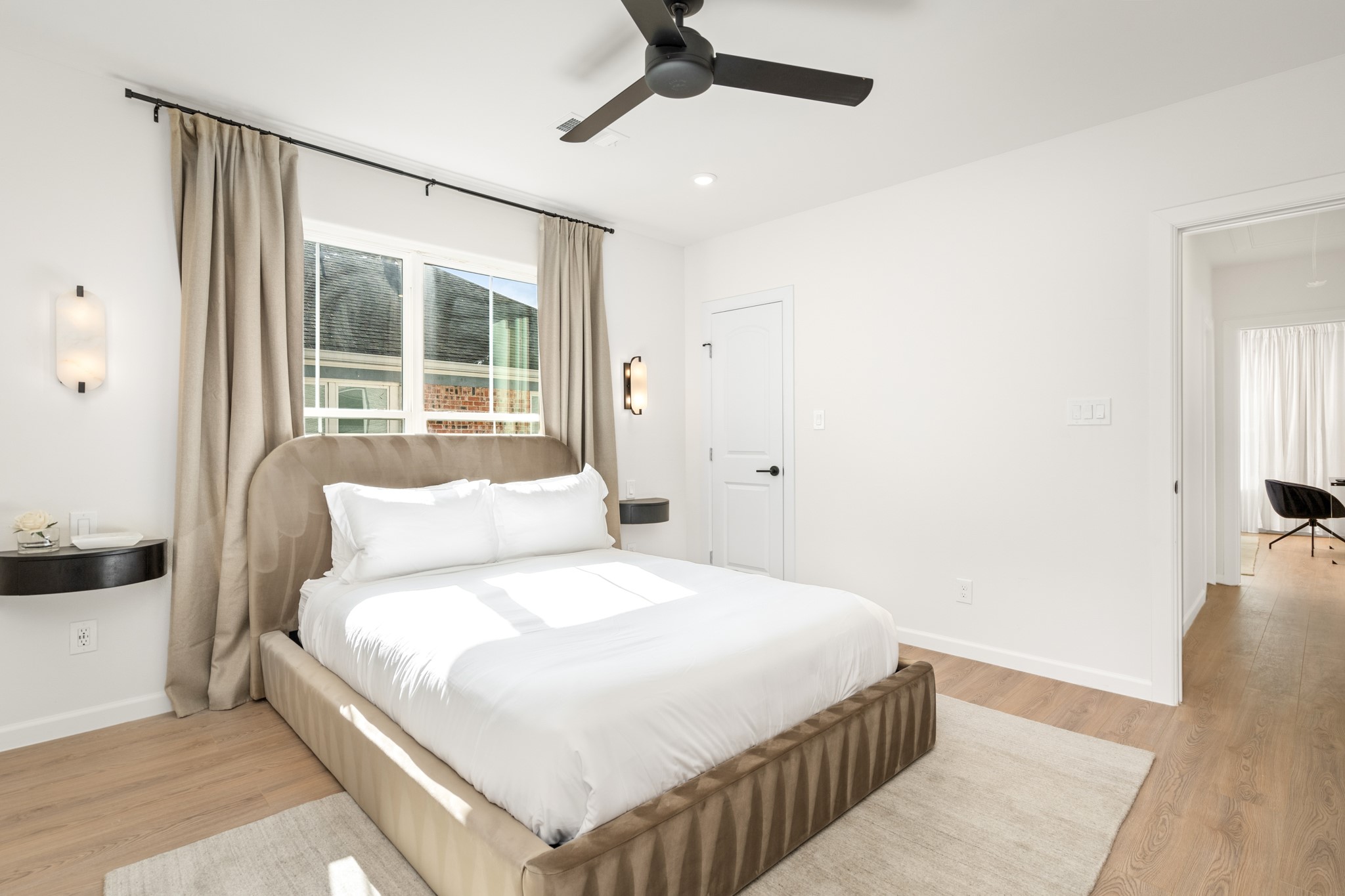 2413 Isabella Street Houston, TX 77004 - Photo 19 of 50 a bedroom with a bed and a window