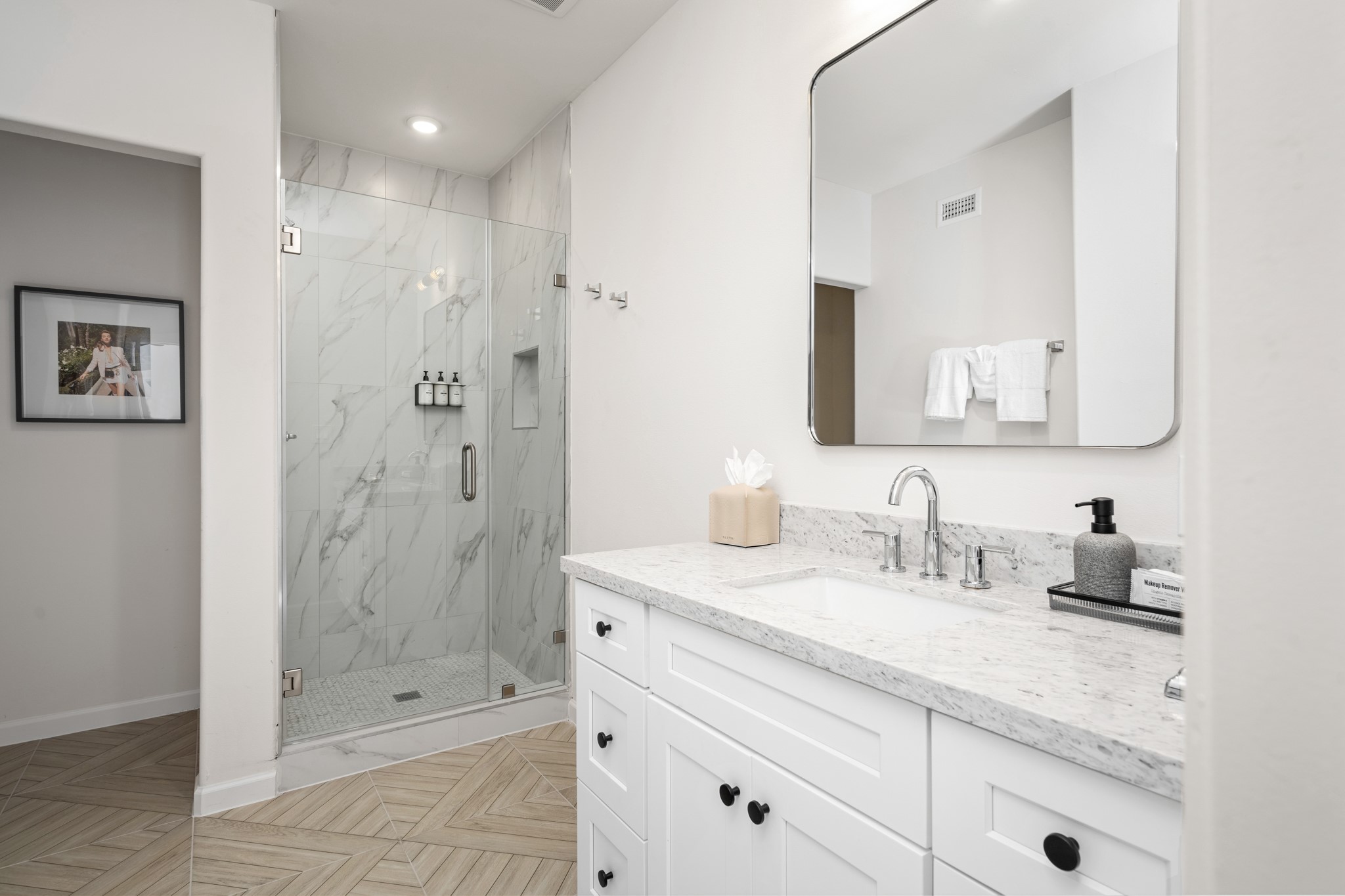 2413 Isabella Street Houston, TX 77004 - Photo 21 of 50 a bathroom with a shower sink vanity and mirror