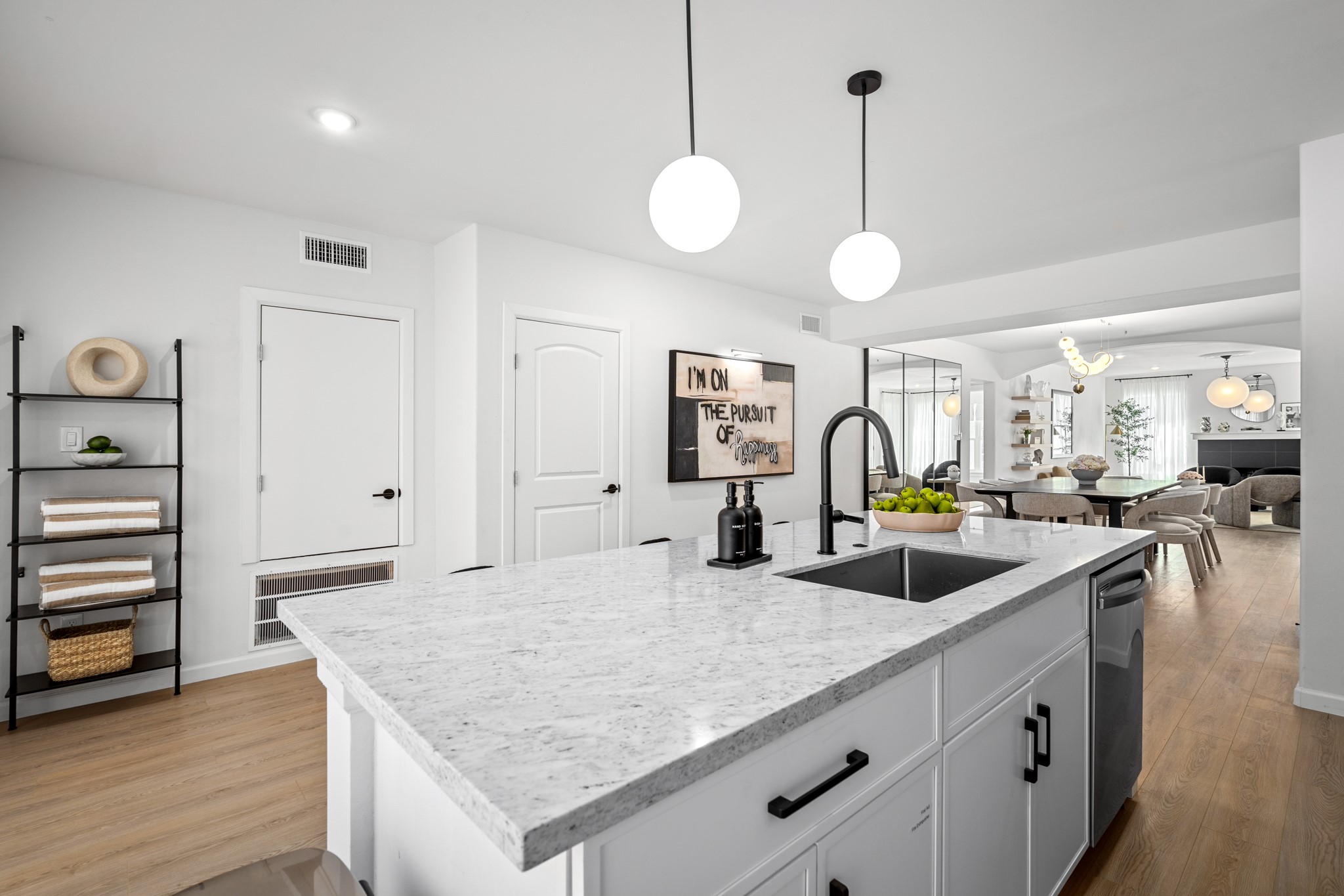 2413 Isabella Street Houston, TX 77004 - Photo 31 of 50 a kitchen with stainless steel appliances granite countertop a sink a stove and a wooden floors