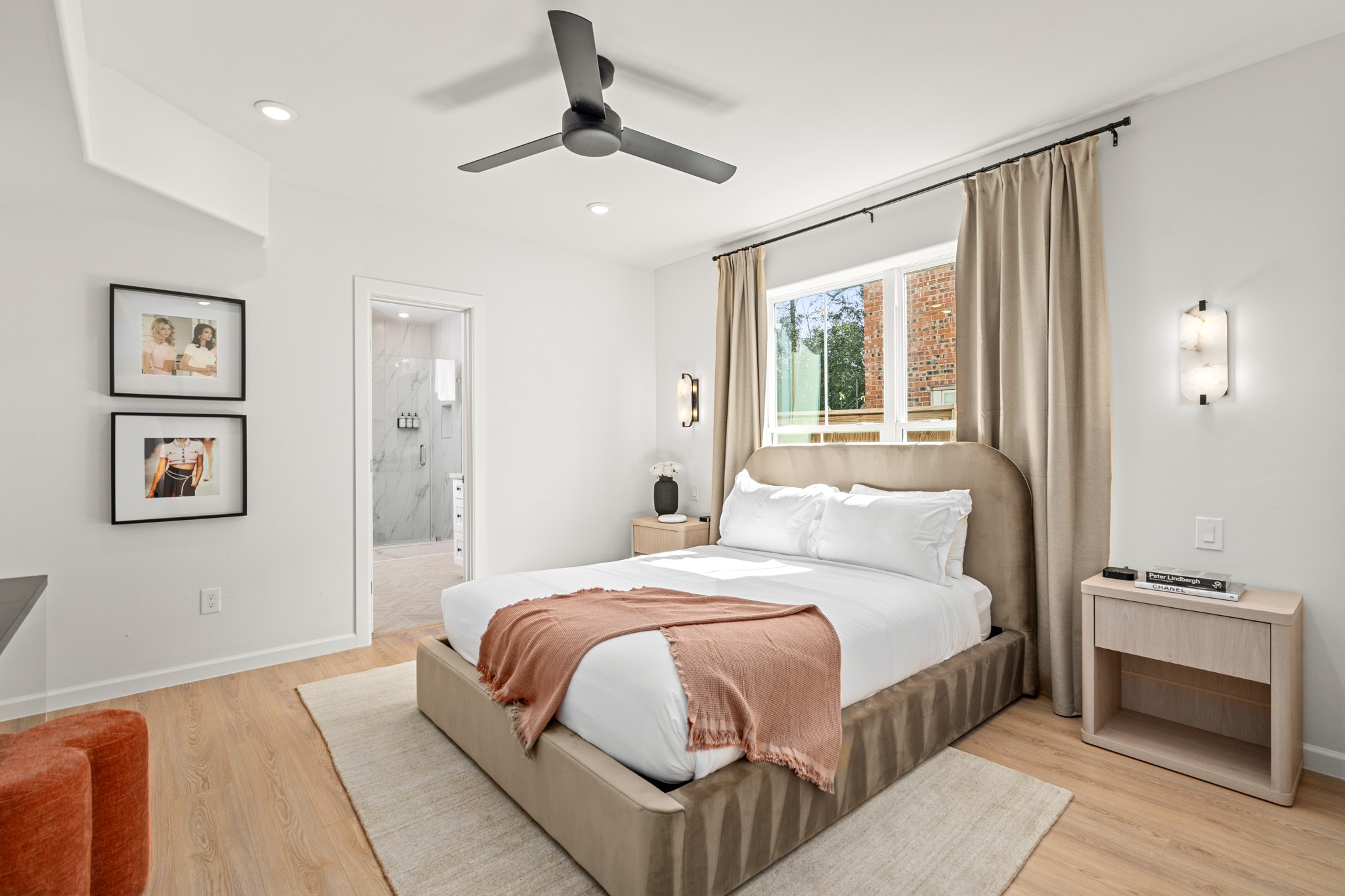 2413 Isabella Street Houston, TX 77004 - Photo 32 of 50 a bedroom with a large bed and a window