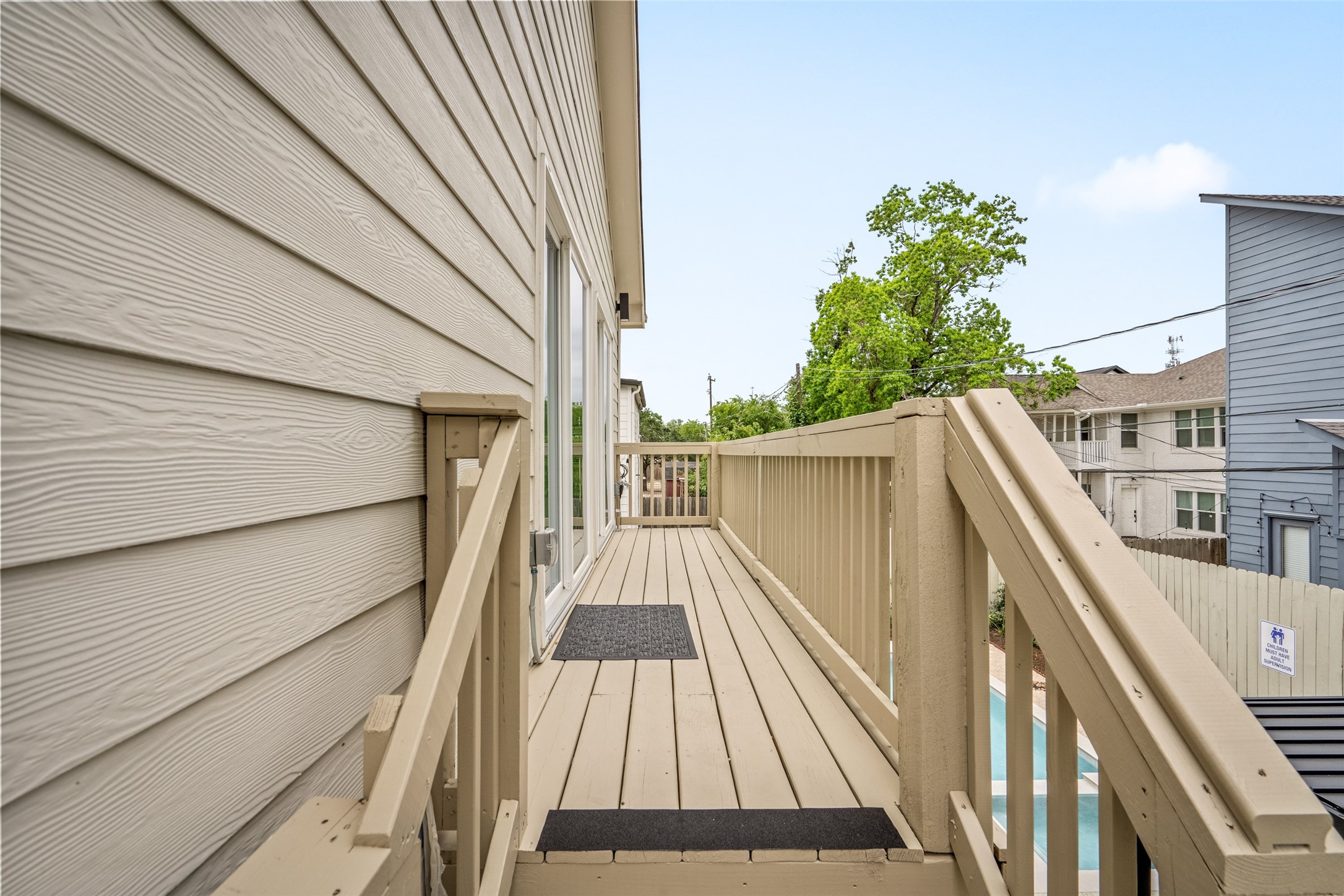 2413 Isabella Street Houston, TX 77004 - Photo 40 of 50 a view of balcony with wooden floor and fence and floor