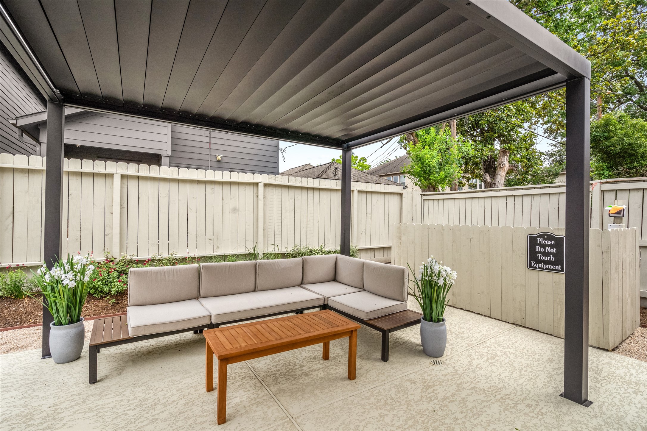 2413 Isabella Street Houston, TX 77004 - Photo 41 of 50 a outdoor living space with furniture and a potted plant