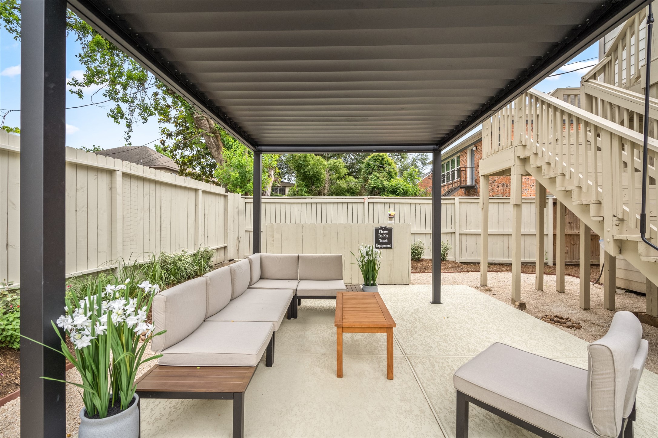 2413 Isabella Street Houston, TX 77004 - Photo 42 of 50 a outdoor living space with patio furniture and garden view
