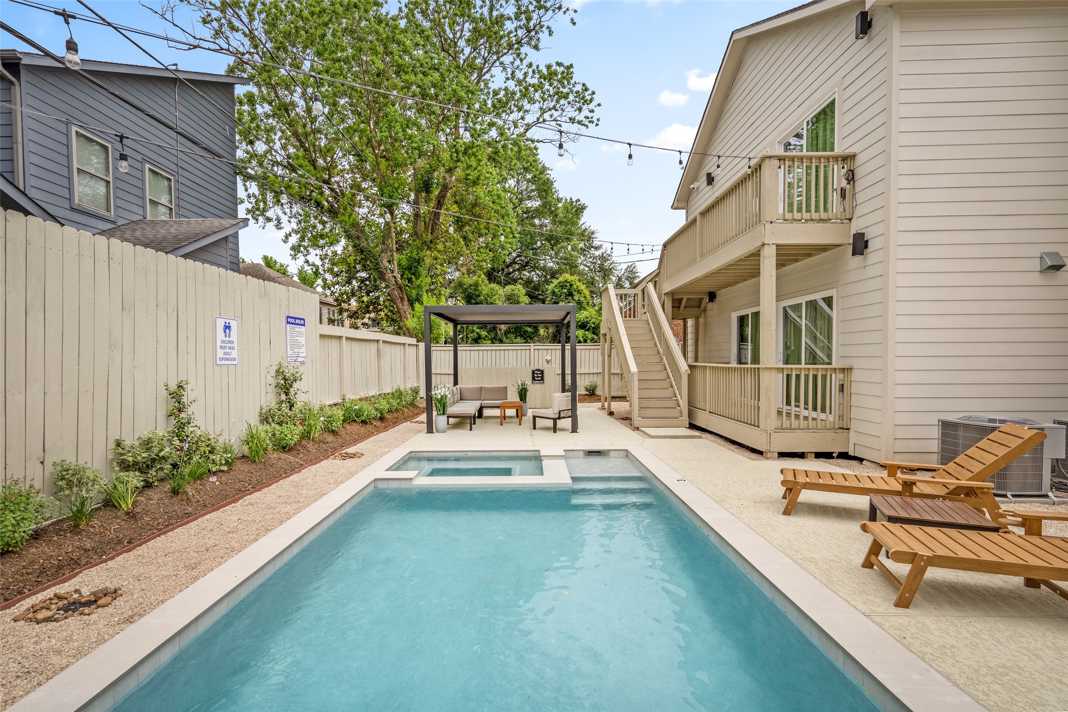 2413 Isabella Street Houston, TX 77004 - Photo 45 of 50 a view of a house with backyard and sitting area