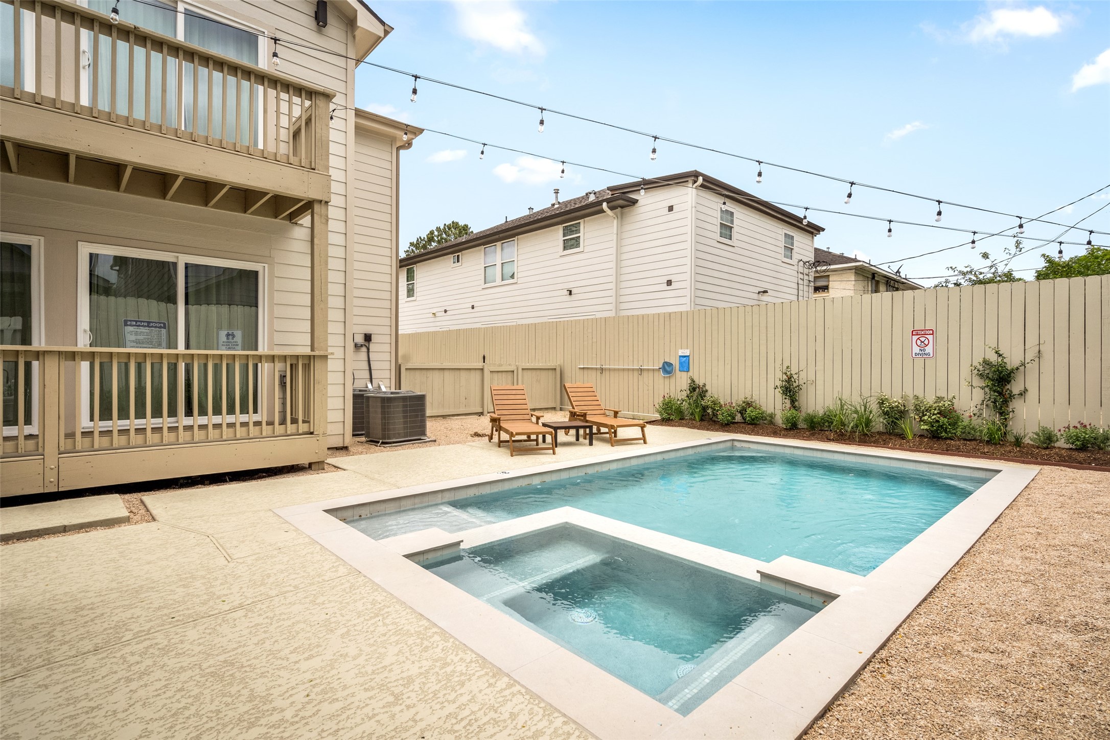 2413 Isabella Street Houston, TX 77004 - Photo 46 of 50 a view of a house with a swimming pool
