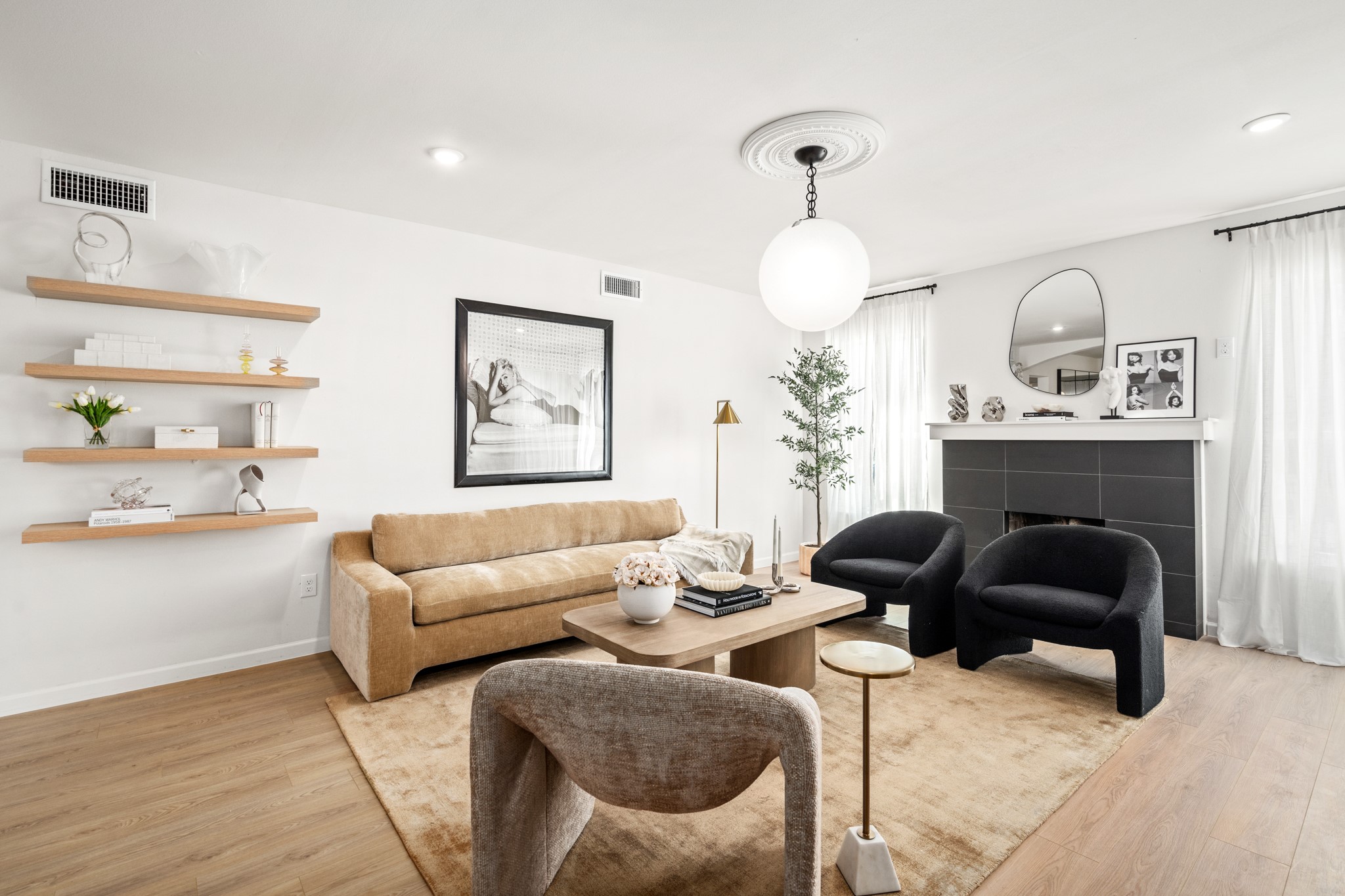 2413 Isabella Street Houston, TX 77004 - Photo 5 of 50 a living room with furniture and a fireplace