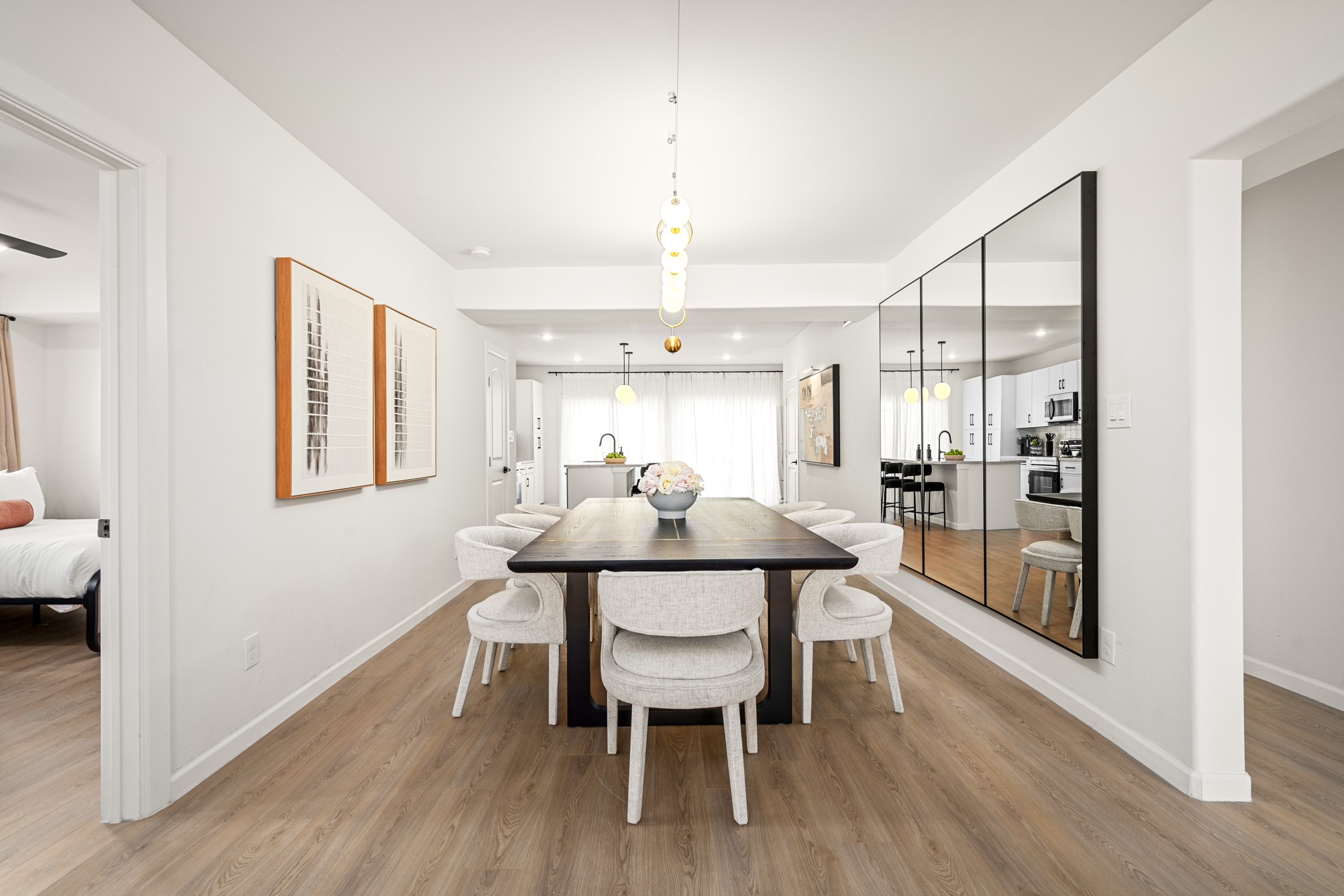2413 Isabella Street Houston, TX 77004 - Photo 8 of 50 a view of a dining room with furniture and wooden floor