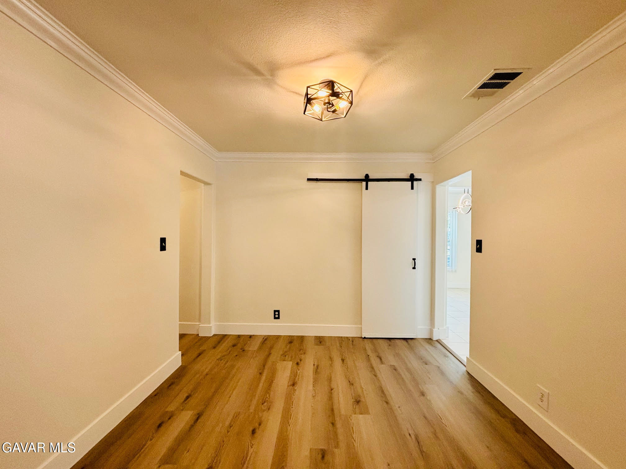 6534 Balcom Avenue Reseda, CA 91335 - Photo 11 of 25 a view of a room with wooden floor