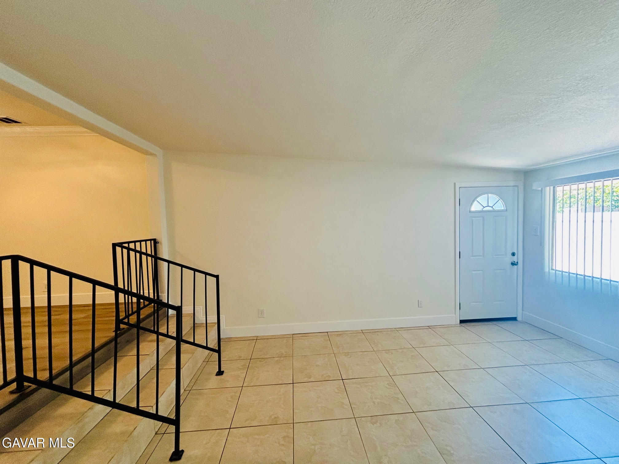 6534 Balcom Avenue Reseda, CA 91335 - Photo 14 of 25 a view of an empty room and window